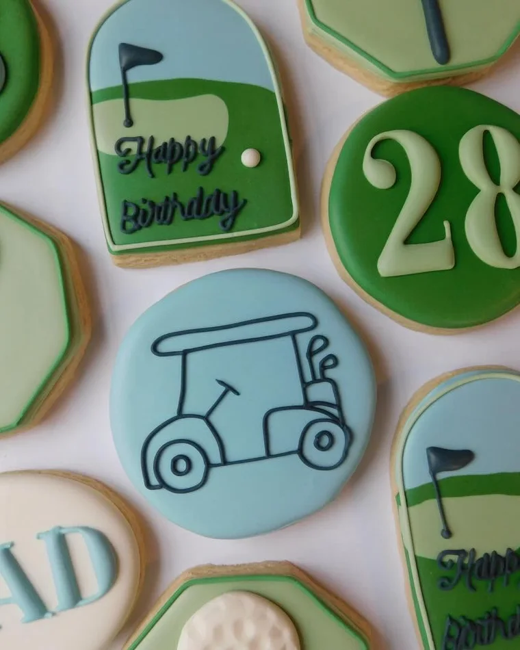 A simple two-color golf-themed cookie set in green and blue.