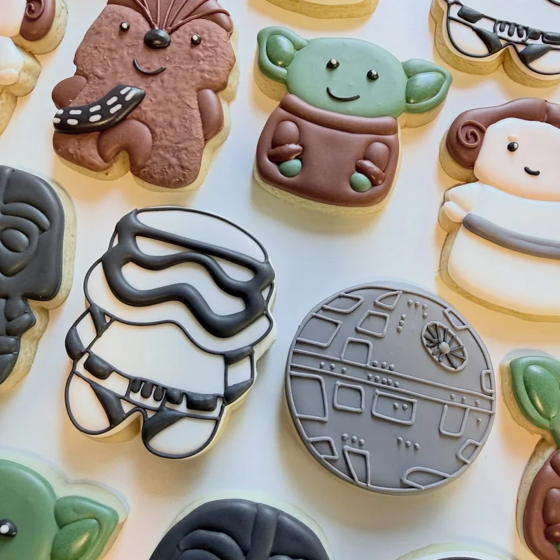 Space-saga character cookies including troopers and a droid.