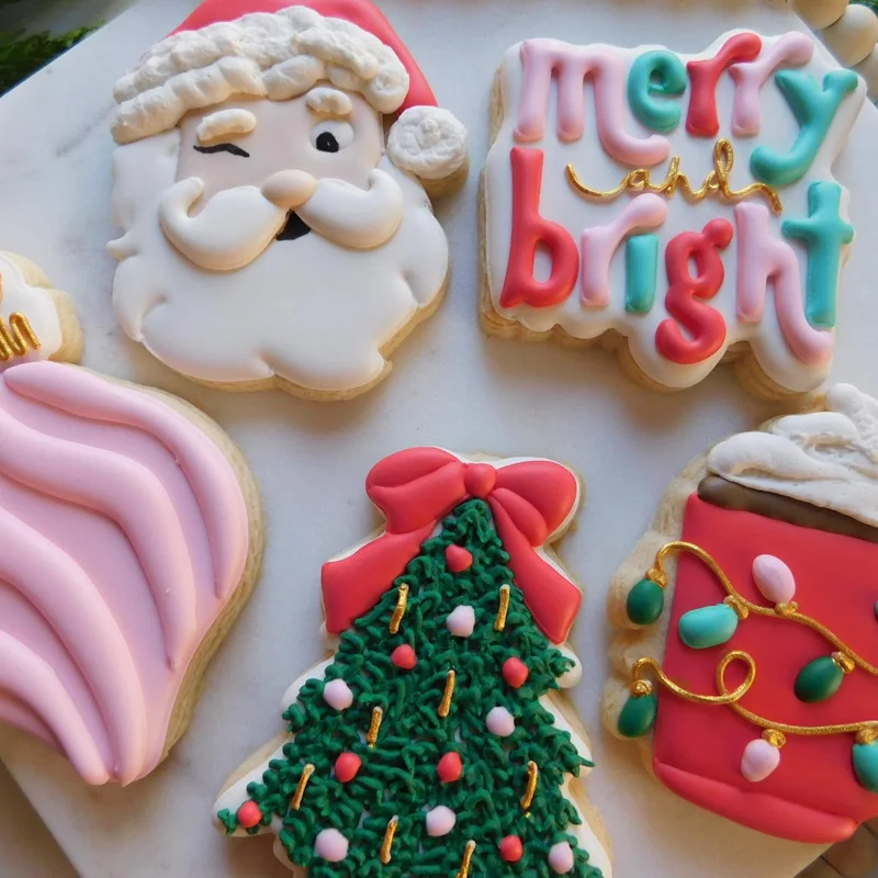 Santa, Christmas tree, and 'merry and bright' cookies.