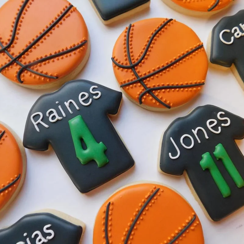 Basketball and team jersey cookies.