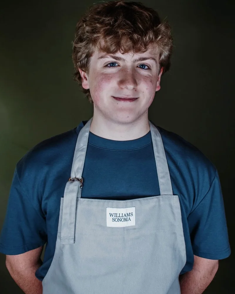 Luke Fox, the baker behind Backwood Baking, in his apron.